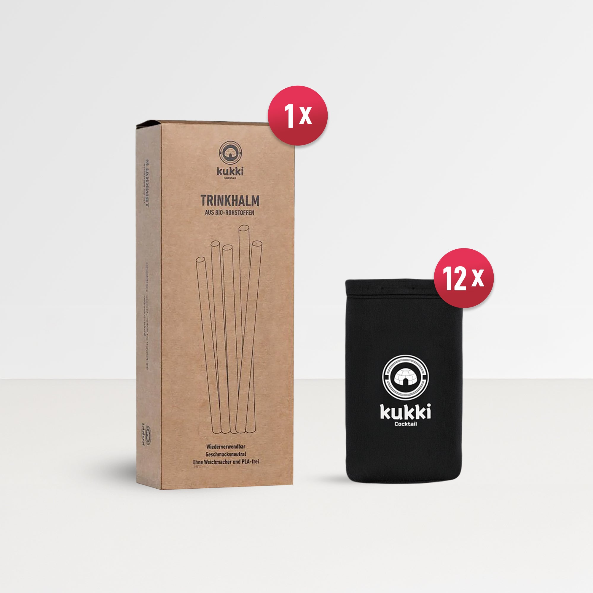 Brauner Karton mit schwarzem kukki Cocktail Logo und Biostrohhalm neben schwarzer Tasche.