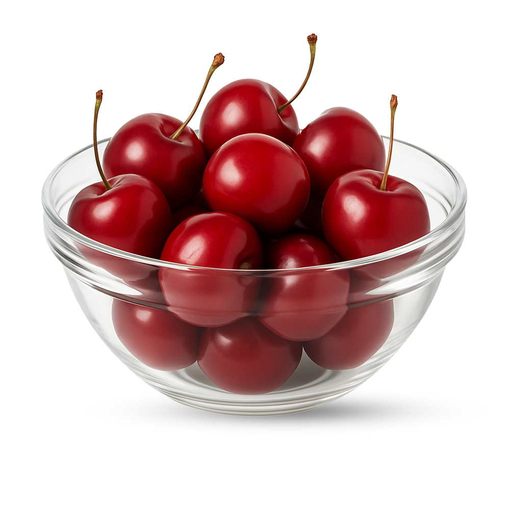 Klare Glasschale mit glänzenden roten Kirschen mit Stielen, frisch und saftig.